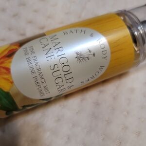 Bath & Body Works “Marigold & Cane Sugar” 90% Full.